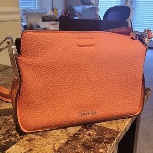 Calvin Klein Pebbled Leather Crossbody Bag - Coral Orange